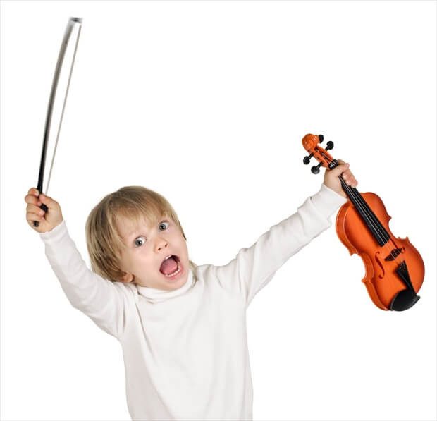 little boy with violin on white background
