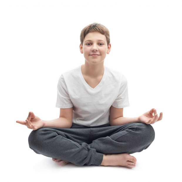 Young boy meditating
